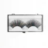 Pestañas postizas efecto arcoíris con glitter holográfico en estuche transparente, ideales para comprar un look de festival profesional.