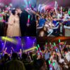 Mega Espuma 50 en uso – Palos de Espuma LED para Fiestas Personas disfrutando en un evento nocturno usando palos de espuma LED Mega Espuma 50 encendidos en varios colores